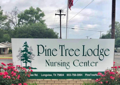 Pine Tree Lodge Monument Sign